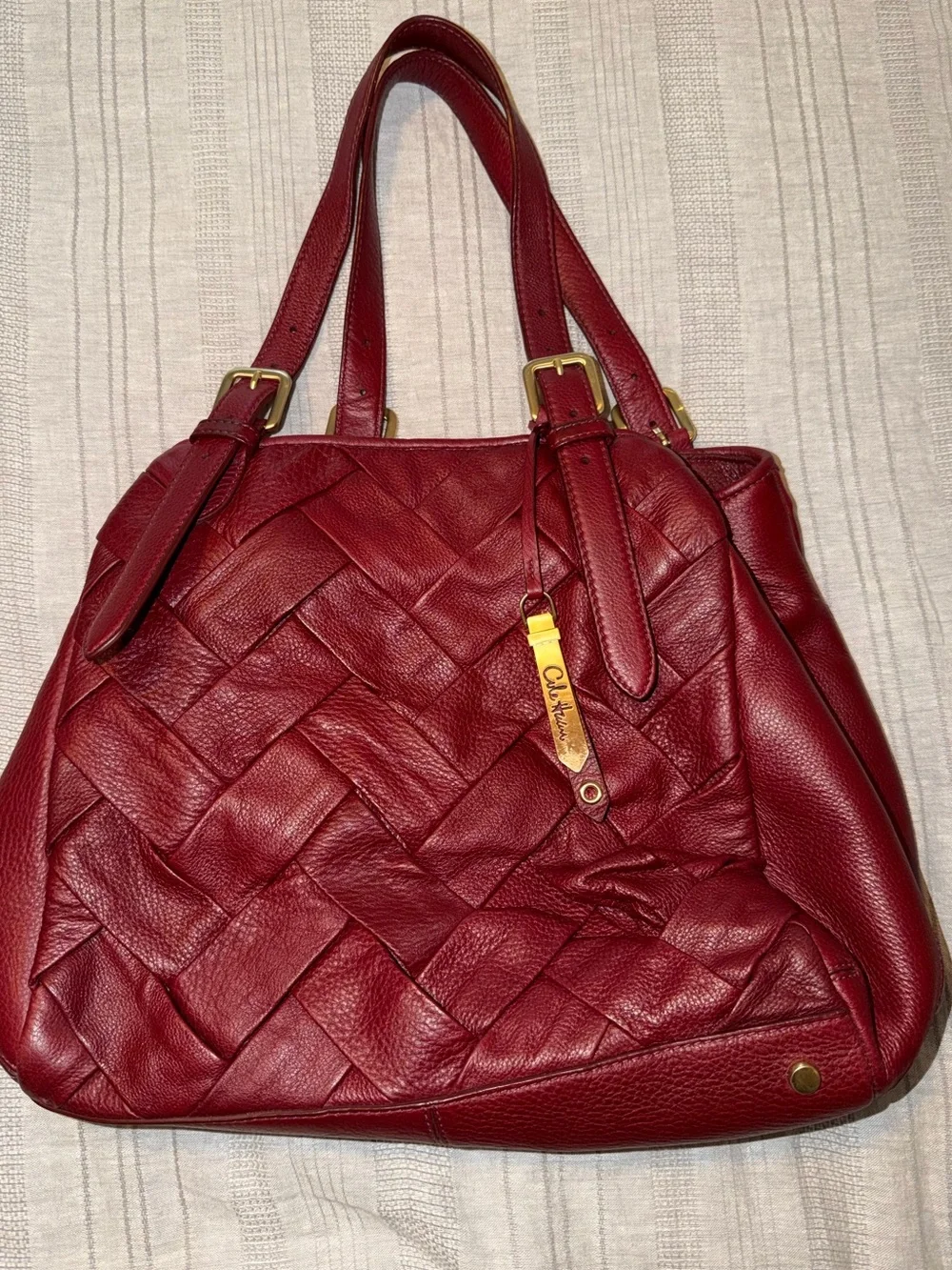 Cole Haan Burgundy Prudence Tote Bag featuring braided leather design